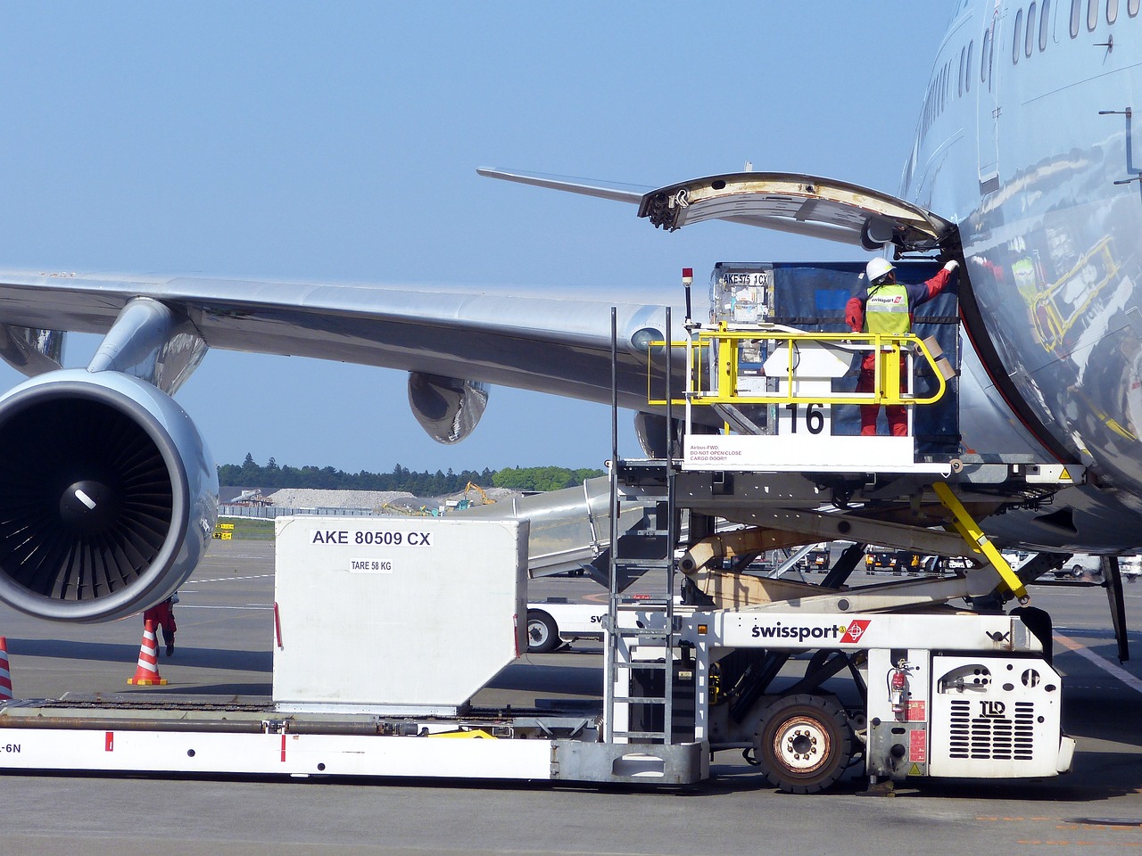 Air cargo charter plane loading freight for a Houston, Texas charter flight